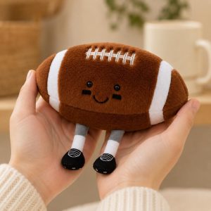 BROWN FOOTBALL PLUSH TOY